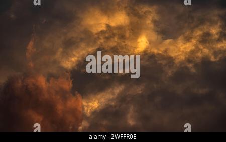 Storm clouds at sunset Stock Photo