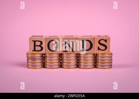 The inscription Bonds made of wooden cubes on a plain background. Can be used for your design Stock Photo
