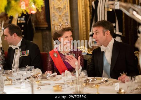 Stockholm, Sweden. 30th Jan, 2024. French President Emmanuel Macron speaks and smiles with Queen Silvia of Sweden during a state dinner at the Royal Palace in Stockholm, Sweden on January 30, 2024.Photo by Eliot Blondet/ABACAPRESS.COM Credit: Abaca Press/Alamy Live News Stock Photo