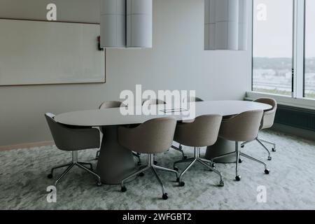 Empty conference table with chairs in board room Stock Photo