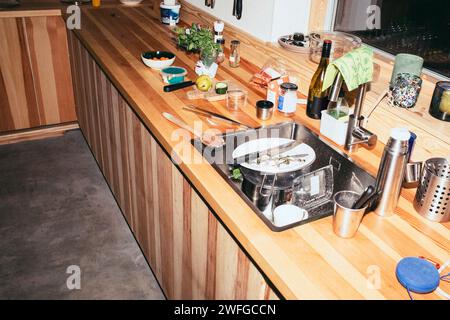 High angle view of dirty dishes in kitchen sink at home Stock Photo