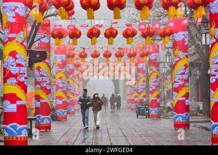 Qingzhou, China. 31st Jan, 2024. Tourists are viewing lanterns to celebrate the upcoming Spring Festival in Qingzhou Ancient City, in Qingzhou, China, on January 31, 2024. (Photo by Costfoto/NurPhoto) Credit: NurPhoto SRL/Alamy Live News Stock Photo