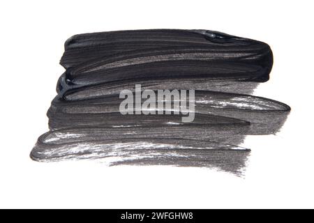 Black Watercolor. Abstract painted ink strokes set on watercolor paper. Stock Photo