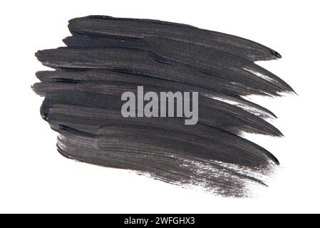 Black Watercolor. Abstract painted ink strokes set on watercolor paper. Stock Photo