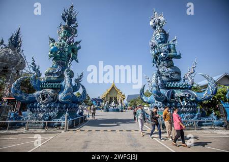 Chiang Rai, Thailand. 19th Jan, 2024. A view of the entrance gate of the Blue Temple. Wat Rong Suea Ten (Temple of the Dancing Tiger), most commonly known as the 'Blue Temple' is a fusion of traditional Buddhist values and classic Thai architecture with contemporary design choices, it was designed by Putha Kabkaew, a student of the artist who built the very well known 'White Temple'. (Photo by Guillaume Payen/SOPA Images/Sipa USA) Credit: Sipa USA/Alamy Live News Stock Photo