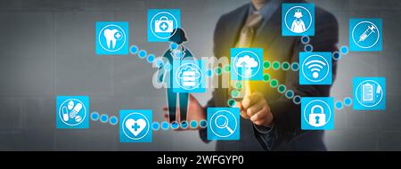 Faceless health care sector administrator transferring patient data via cloud computing applications. Healthcare technology concept for cloud computin Stock Photo