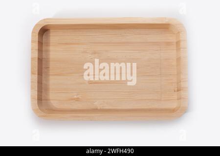wooden tray isolated on white surface Stock Photo
