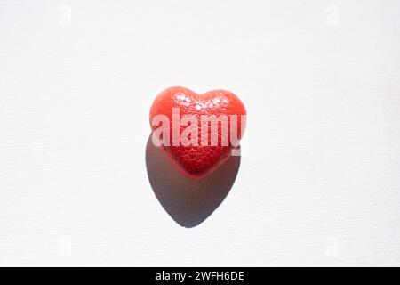 spray painted red heart on white background Stock Photo