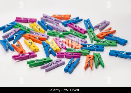 many colorful clothespins isolated on white background Stock Photo