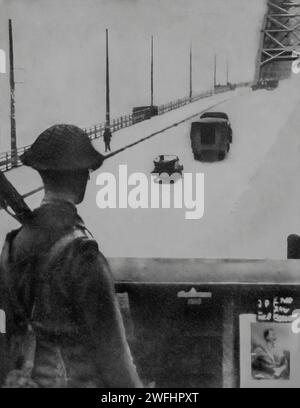 A British soldier in a command post overlooking the Nijmegen Bridge in the Netherlands. Crossing the River Rhine, it was a vital bridgehead into the Eindhoven corridor taken in September 1944 by Allied troops during the second World War. Stock Photo