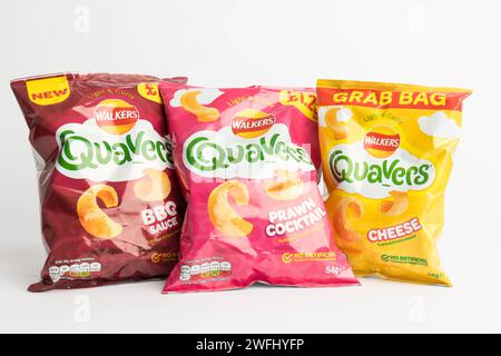 London, United Kingdom, 29th January 2024:- A selection of  Walkers Quavers British Potato Snacks on a white background Stock Photo