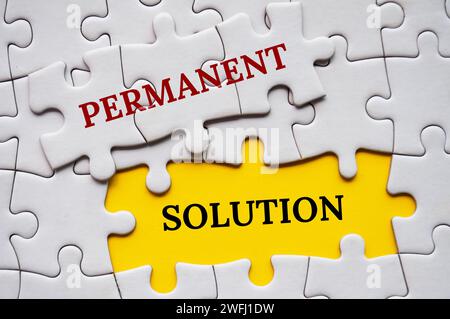 Permanent Solution text on missing jigsaw puzzle. Strategic problem solving concept Stock Photo