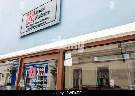 Merida Mexico,Zona Paseo Montejo Centro,Calle 47,real estate office broker sales rentals,sign outside exterior,building front entrance,English languag Stock Photo