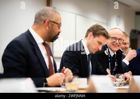 Home Secretary James Cleverly (left), Policing Minister Chris Philp (centre) and Metropolitan Police Commissioner Sir Mark Rowley (third left), attend the National Policing Board meeting at the Home Office in London. Picture date: Wednesday January 31, 2024. Stock Photo