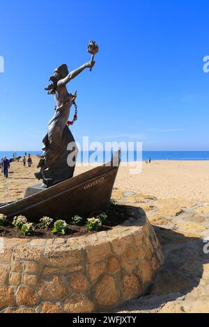 Rota, Cadiz, Spain- October 10, 2023:Freedom monument in the promenade of Playa de la Costilla beach on a sunny day Stock Photo