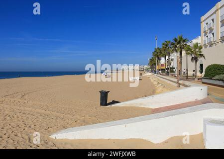 Rota, Cadiz, Spain- October 10, 2023:Playa de la Costilla beach and promenade in Rota city, Cadiz, on a sunny day Stock Photo