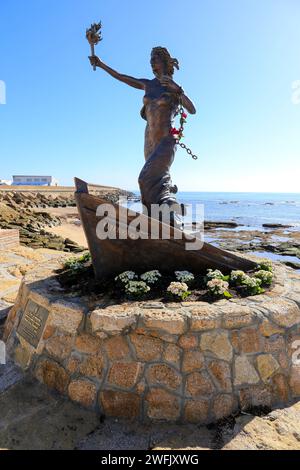 Rota, Cadiz, Spain- October 10, 2023:Freedom monument in the promenade of Playa de la Costilla beach on a sunny day Stock Photo