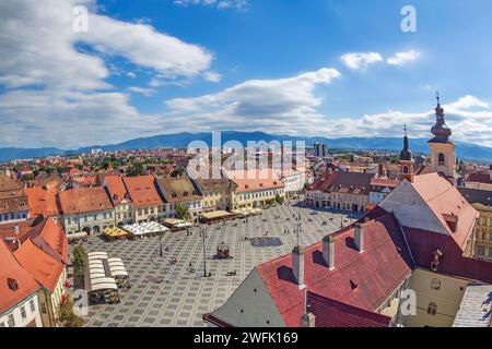 SIBIU,TRANSYLVANIA,ROMANIA-JULY 8,2020:Aerial view from the Council Tower over The Big Square,part of the old city center.Founded by German settlers,w Stock Photo