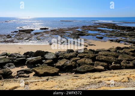 Playa de la Costilla beach and promenade in Rota city, Cadiz, on a sunny day Stock Photo