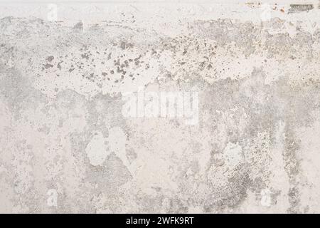 Detail of damaged wall of a home interior. Full frame Stock Photo