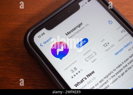 Facebook Messenger app seen in App Store on iPhone. Messenger, is an US proprietary instant messaging app and platform developed by Meta Platforms Stock Photo