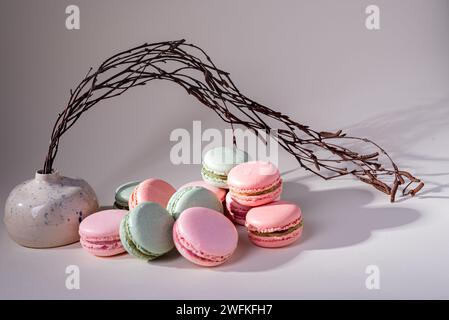 Close up colorful macarons dessert on white background. Stock Photo