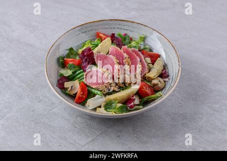 salad with carpaccio, artichoke and asparagus on a stone background, studio food photography 4 Stock Photo