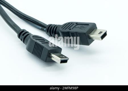 Mini USB plug, cable seen in close-up. Stock Photo