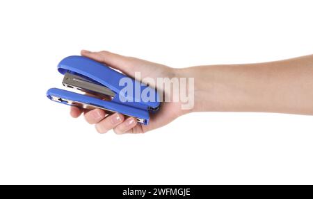 Woman holding blue stapler on white background, closeup Stock Photo