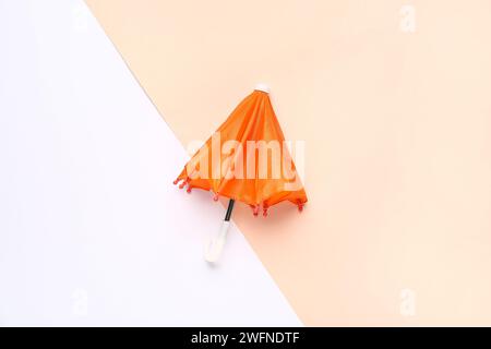 Mini stylish umbrella on colorful background Stock Photo