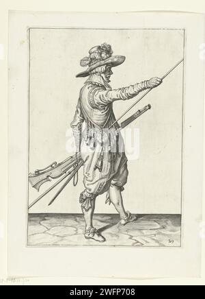Soldier with a musket that slides his right hand to the end of his chest of drawers, Jacques de Gheyn (II) (workshop of), after Jacques de Gheyn (II), 1597 - 1607 print A soldier, to the right, who holds a musket (a certain type of firearm) with his left hand at his left thigh and brings his right hand to the end of his seam, which he has supported against his right side. In his left hand in addition to the musket also a wick; On his left pols a furmeric (musket fork). This print is part of the series of 43 numbered prints of Musketeers from the arms handling. Netherlands paper engraving manoe Stock Photo