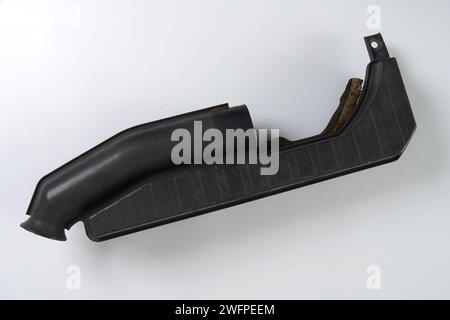 an air filter pipe from a car engine that needs to be replaced Stock Photo