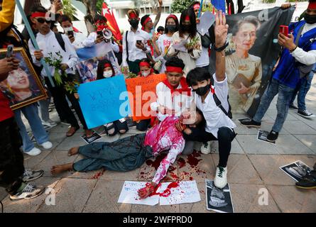 Bangkok, Thailand. 01st Feb, 2024. Protesters perform a student being shot ? by the ruling military junta during a rally to mark the third anniversary of the coup in Myanmar in front of the United Nations Building in Bangkok. Myanmar's military seized power on February 1, 2021, ousting the civilian government and arresting its de facto leader, Aung San Suu Kyi. (Photo by Chaiwat Subprasom/SOPA Images/Sipa USA) Credit: Sipa USA/Alamy Live News Stock Photo