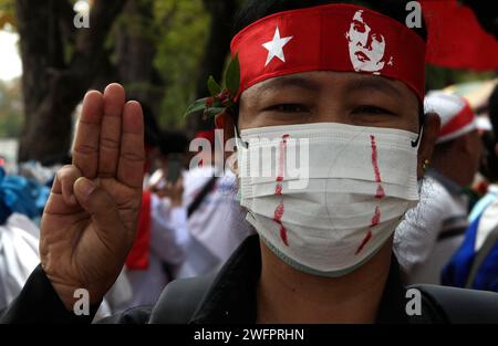 Bangkok, Thailand. 01st Feb, 2024. A protester makes a three-finger salute during a rally to mark the third anniversary of the coup in Myanmar in front of the United Nations Building in Bangkok. Myanmar's military seized power on February 1, 2021, ousting the civilian government and arresting its de facto leader, Aung San Suu Kyi. (Photo by Chaiwat Subprasom/SOPA Images/Sipa USA) Credit: Sipa USA/Alamy Live News Stock Photo