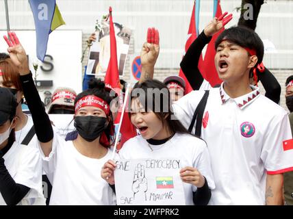 Bangkok, Thailand. 01st Feb, 2024. Protesters chant slogans while making three-finger salutes during a rally to mark the third anniversary of the coup in Myanmar in front of the United Nations Building in Bangkok. Myanmar's military seized power on February 1, 2021, ousting the civilian government and arresting its de facto leader, Aung San Suu Kyi. Credit: SOPA Images Limited/Alamy Live News Stock Photo