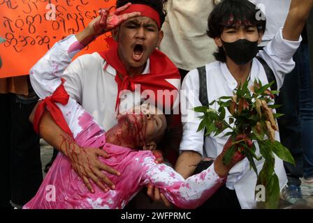 Bangkok, Thailand. 01st Feb, 2024. Protesters perform a student being shot ? by the ruling military junta during a rally to mark the third anniversary of the coup in Myanmar in front of the United Nations Building in Bangkok. Myanmar's military seized power on February 1, 2021, ousting the civilian government and arresting its de facto leader, Aung San Suu Kyi. (Photo by Chaiwat Subprasom/SOPA Images/Sipa USA) Credit: Sipa USA/Alamy Live News Stock Photo