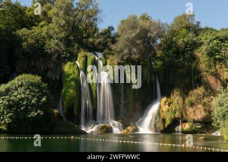 Kravice waterfalls on river Trebizat in summer during sunny day, long exposure with silky water Stock Photo