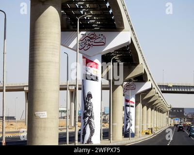 Cairo, Egypt, September 28 2023: 6th of October 1973 war victory 50th anniversary banner, Egyptian flag, national day of Egyptian victories on monorai Stock Photo