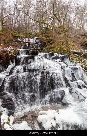 A frozen waterfall on The Birks of Aberfeldy walk Stock Photo