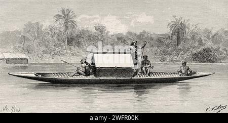 Indigenous Dayaks in a traditional boat, Kalimantan. Borneo Island, Indonesia. From Koutei to Banjarmasin, a journey through Borneo by Carl Bock (1849 - 1932) Stock Photo