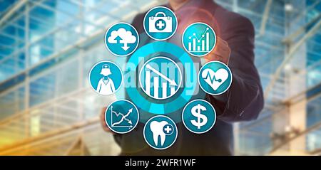 Unrecognizable data manager operating an analytics application designed to monitor healthcare cost reduction. Information technology concept for healt Stock Photo