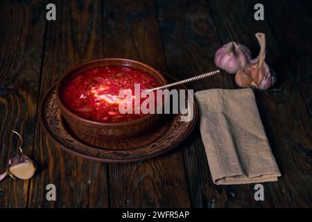 Traditional borscht in ladle, beetroot soup borsch isolated on white ...