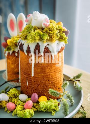 Paska - the Easter Eve sweet bread with icing decorated with eatable "moss" still life. Popular dessert during Eastern Orthodox Easter Holiday. Old cu Stock Photo