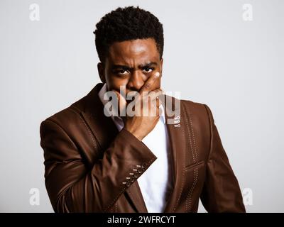 Portrait of young businessman who is angry. Stock Photo