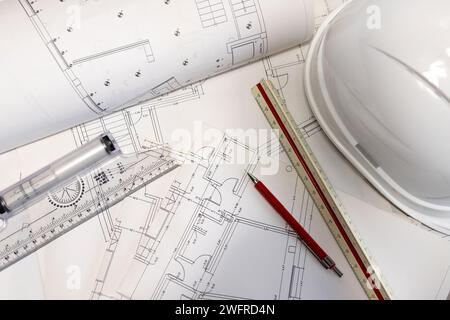 Top view of an architecture plans, hard hat and architect tools on table. Real estate development Stock Photo