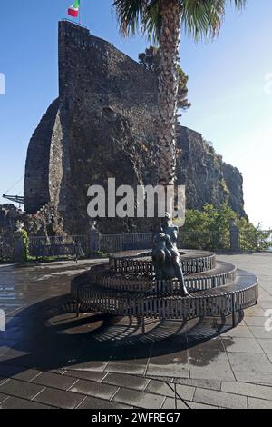 Sculpture in piazzo, Castello Normanno, Aci Castello, Catania, Sicily Stock Photo