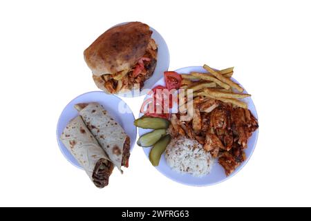 doner kebabs, wrap, sandwich and doner kebab on plate, isolated on white background Stock Photo