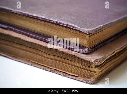 Close up of old books isolated on white. Antique books. Stock Photo