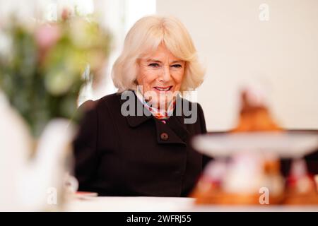 Queen Camilla meeting residents of St John's Foundation almshouses at the Chapel of St Michael Within as she carry out engagements celebrating the 850th anniversary of St John's Foundation in Bath. Picture date: Thursday February 1, 2024. Stock Photo