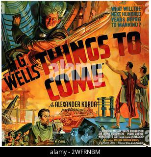 A colorful movie poster for 'H.G. Wells THINGS TO COME' featuring futuristic imagery with a large machine-like structure, people in period clothing, and aircraft in the sky. The text poses the question 'WHAT WILL THE NEXT HUNDRED YEARS BRING TO MANKIND?' The style is a typical 1930s film poster with vibrant colors and dynamic composition. Stock Photo
